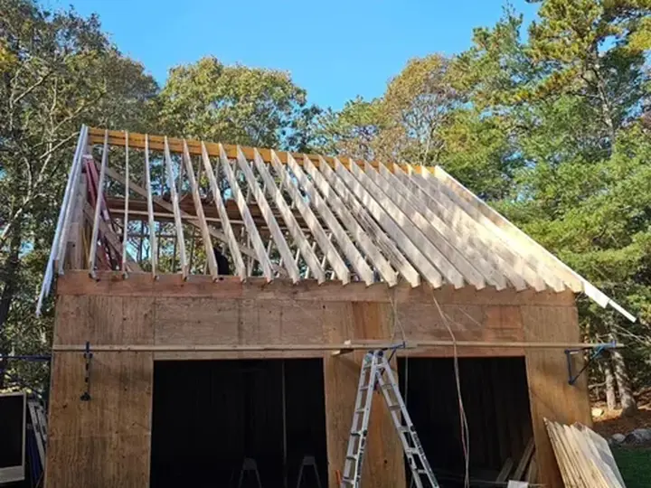 Roof framing and rafters under construction